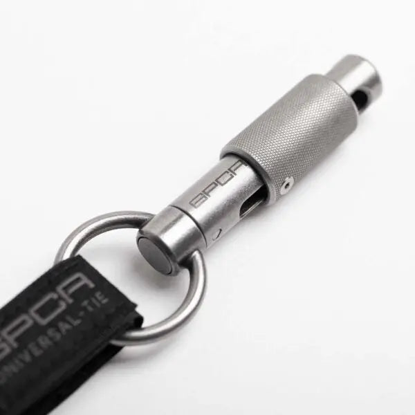 GPCA X-Clip keychain size comparison in hand
