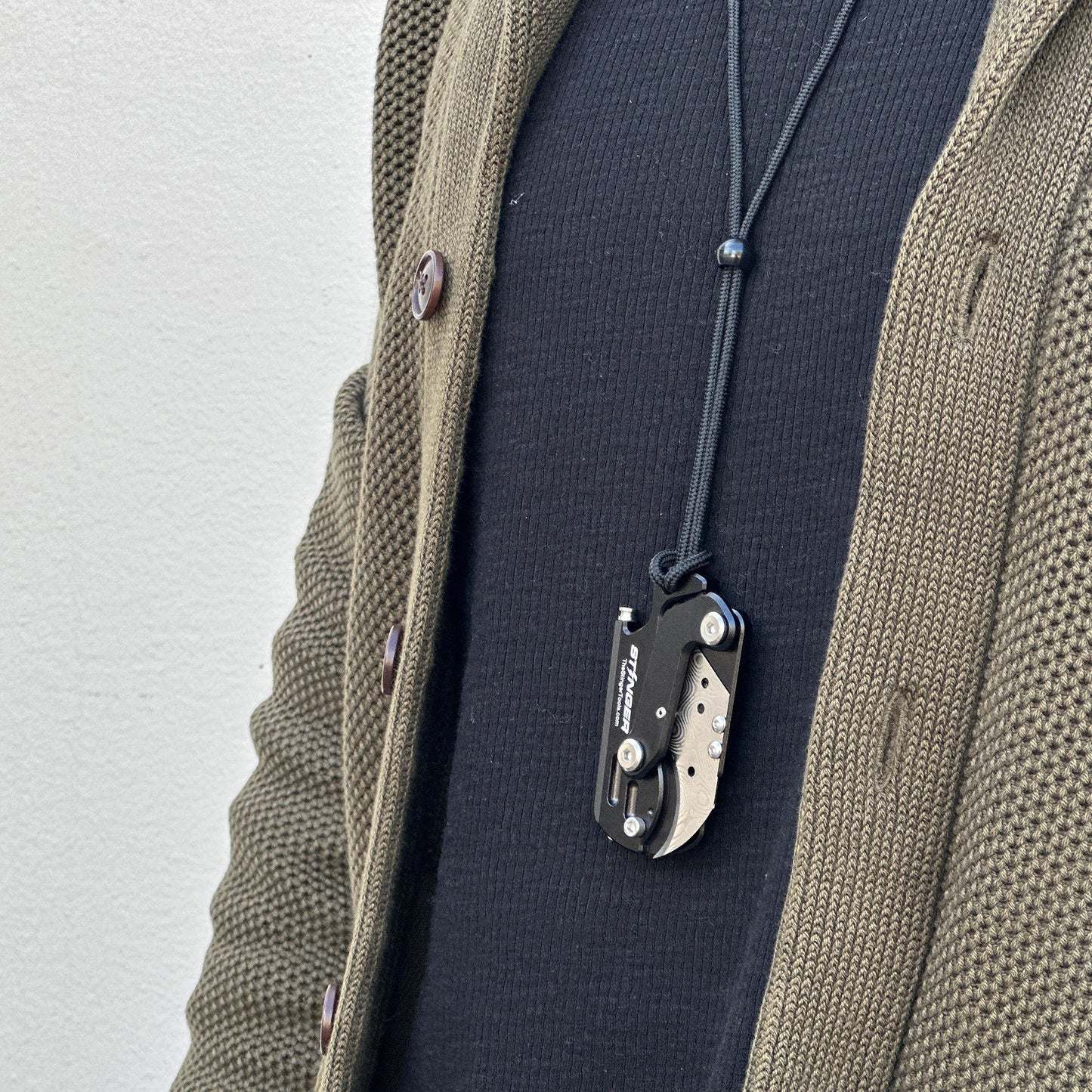 Stinger Dog Tag Tool — compact size on keychain