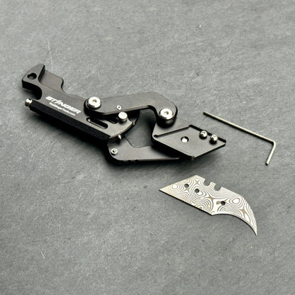 Stinger Dog Tag Tool — belt clip carry option