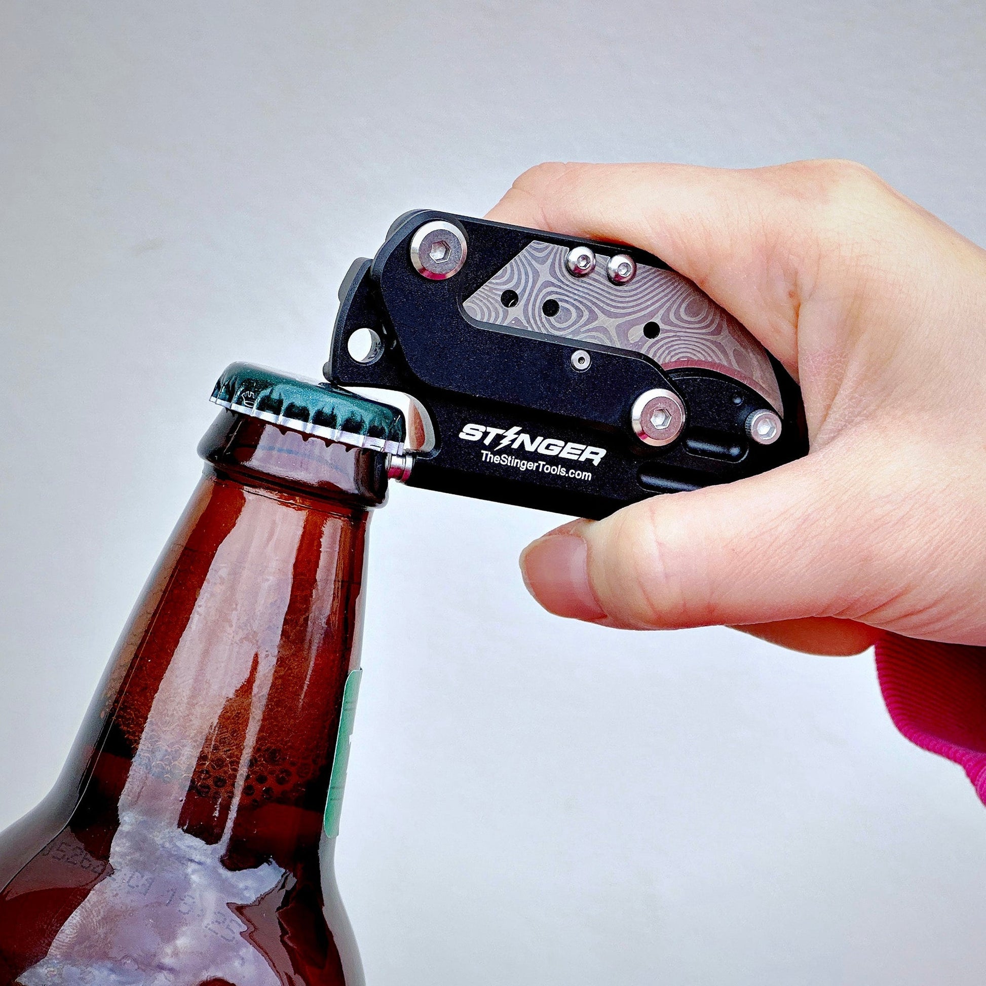 Stinger Dog Tag Tool — packaging and product contents